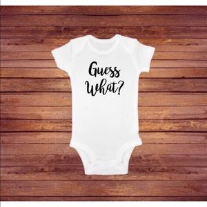 Guess What pregnancy announcement onesie